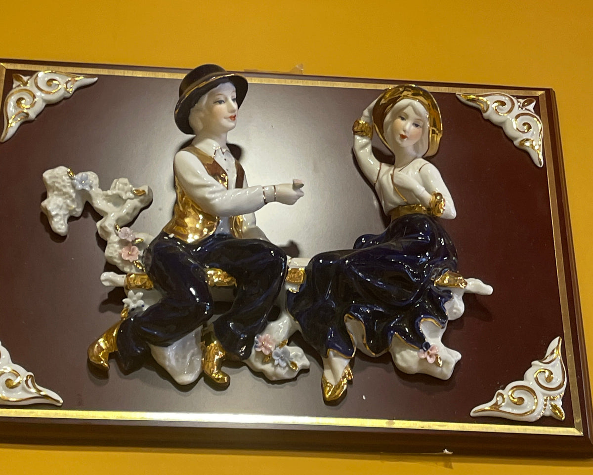 3-D boy proposing girl find porcelain wall art