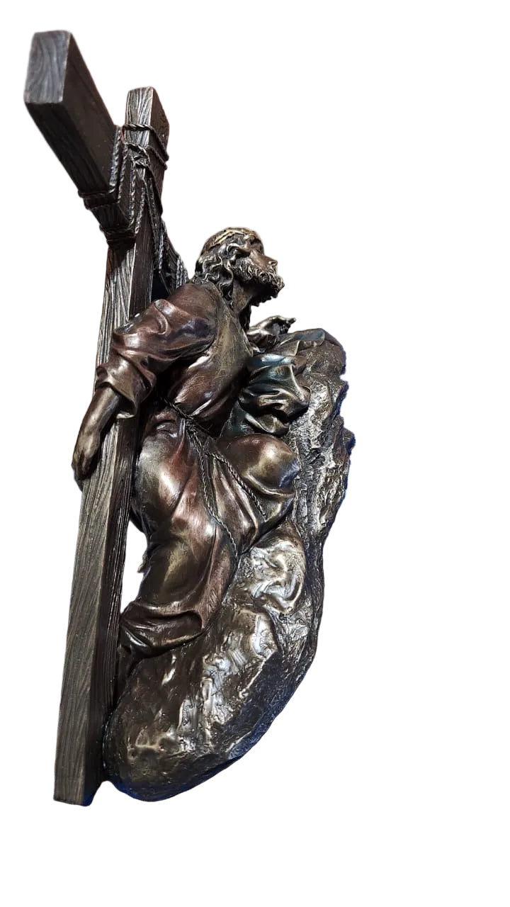 Jesus Christ Caring a cross in bronze color
