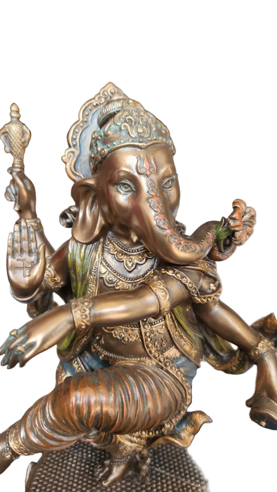 Lord Ganesha in a dancing position in bronze
