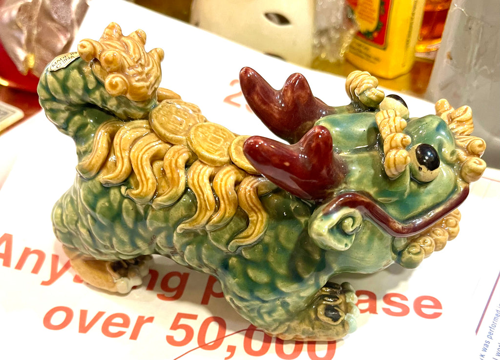 Jade Pixiu statue,pixiu symbol,pixiu Chinese,Pixiu is a symbol of good luck and money flowing
