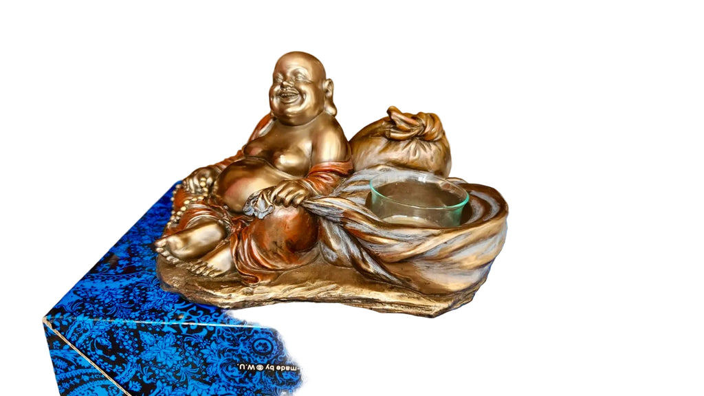 Laughing Buddha in Bronx with the candleholder
