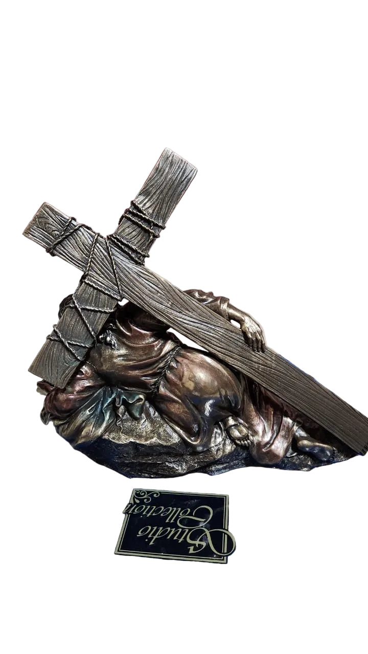 Jesus Christ Caring a cross in bronze color