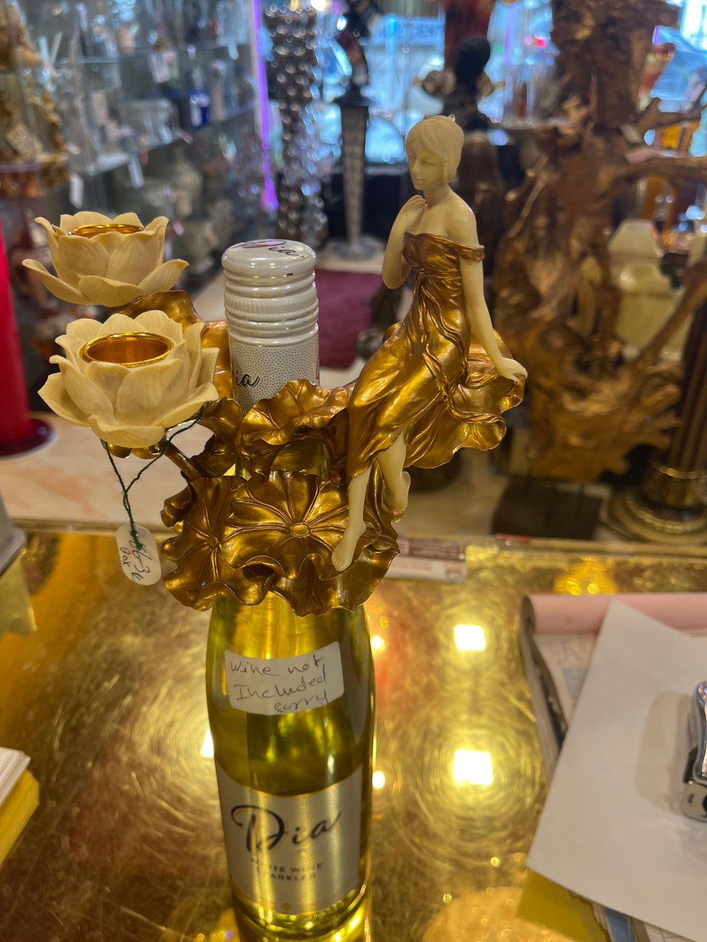 Art nouveau candle holder with wine bottle holder