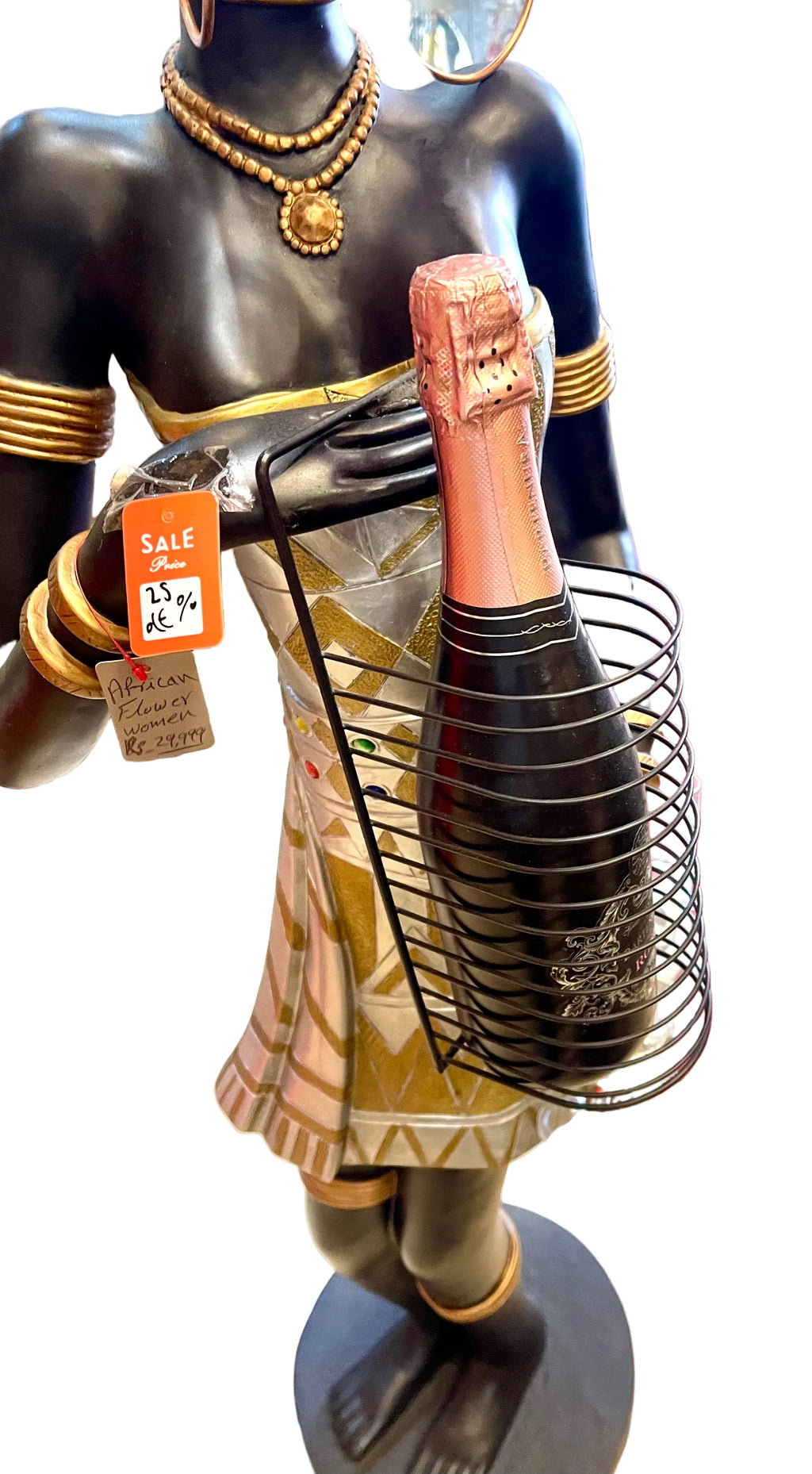 African woman holding a champagne bottle with glasses