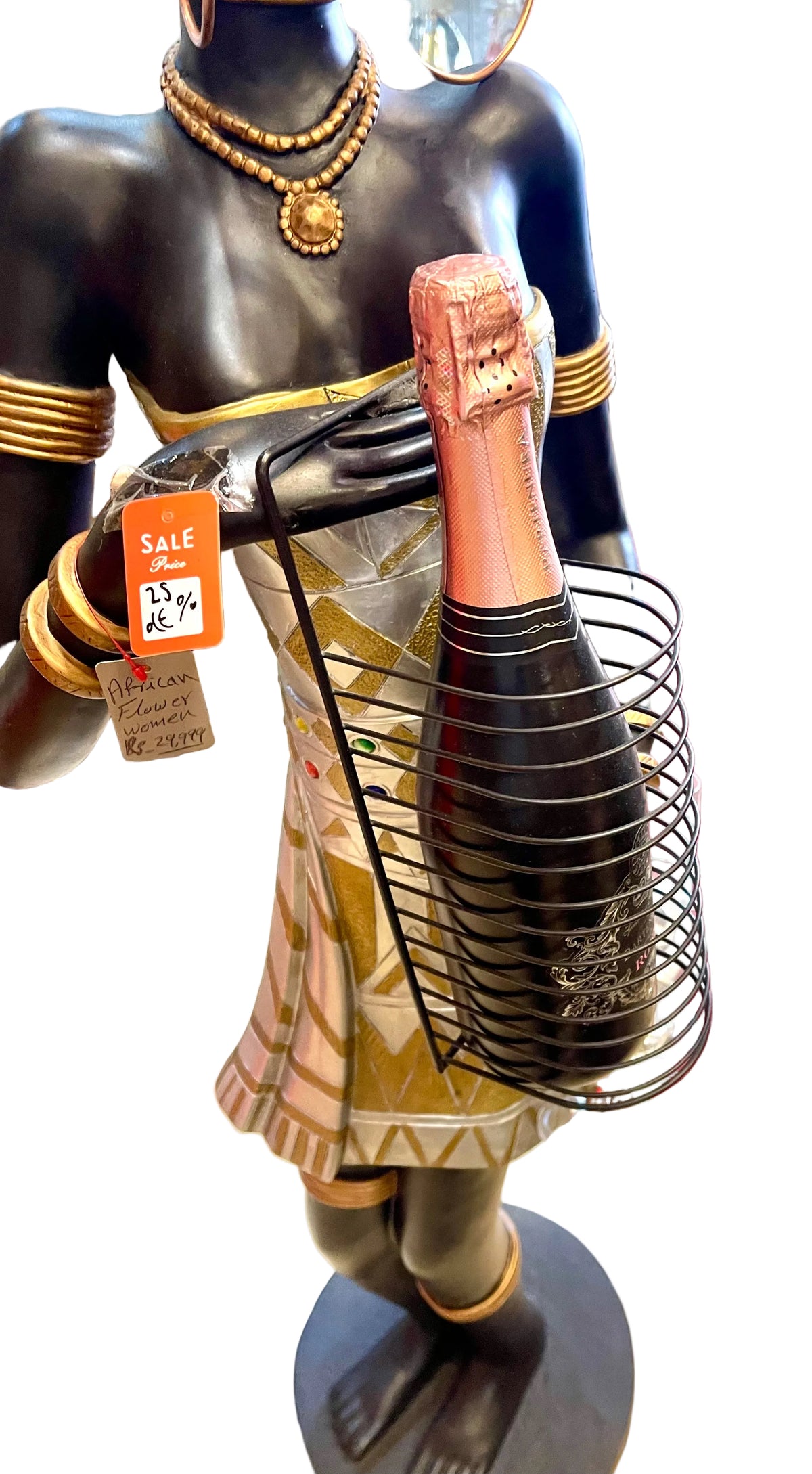 African woman holding a champagne bottle with glasses