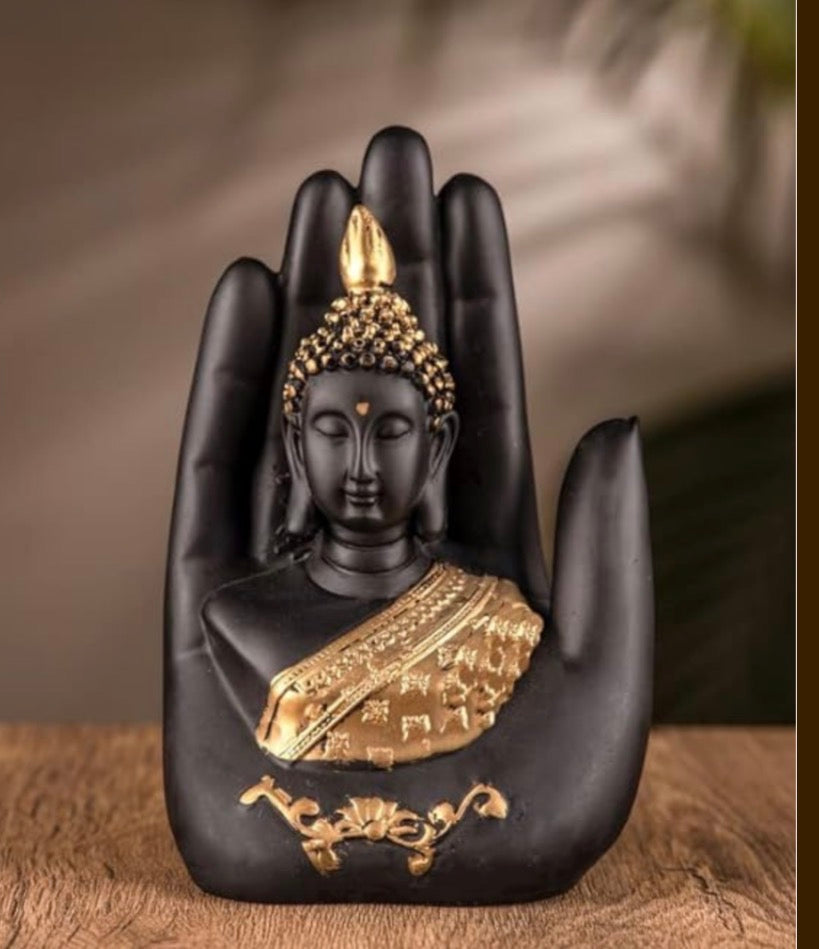 Lord Buddha in a palm