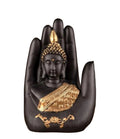Lord Buddha in a palm