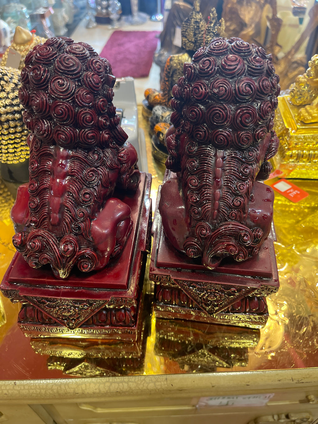 Fu foo dog in burgundy, red cour very heavy 9.5” H