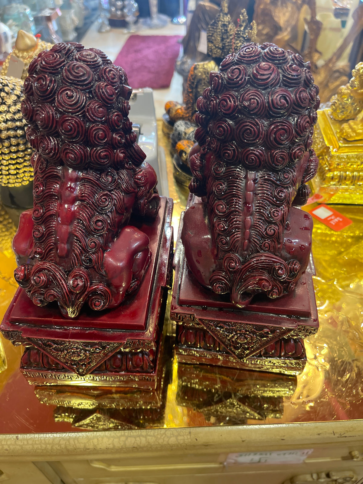 Fu foo dog in burgundy, red cour very heavy 9.5” H