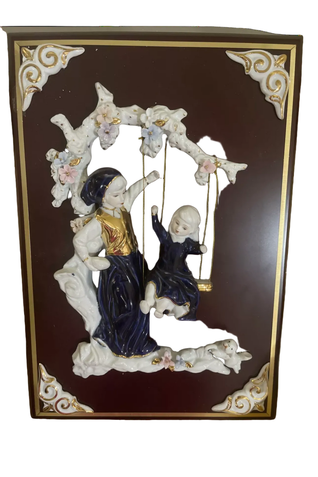 Brother and sister unassuming wall sculpture in porcelain