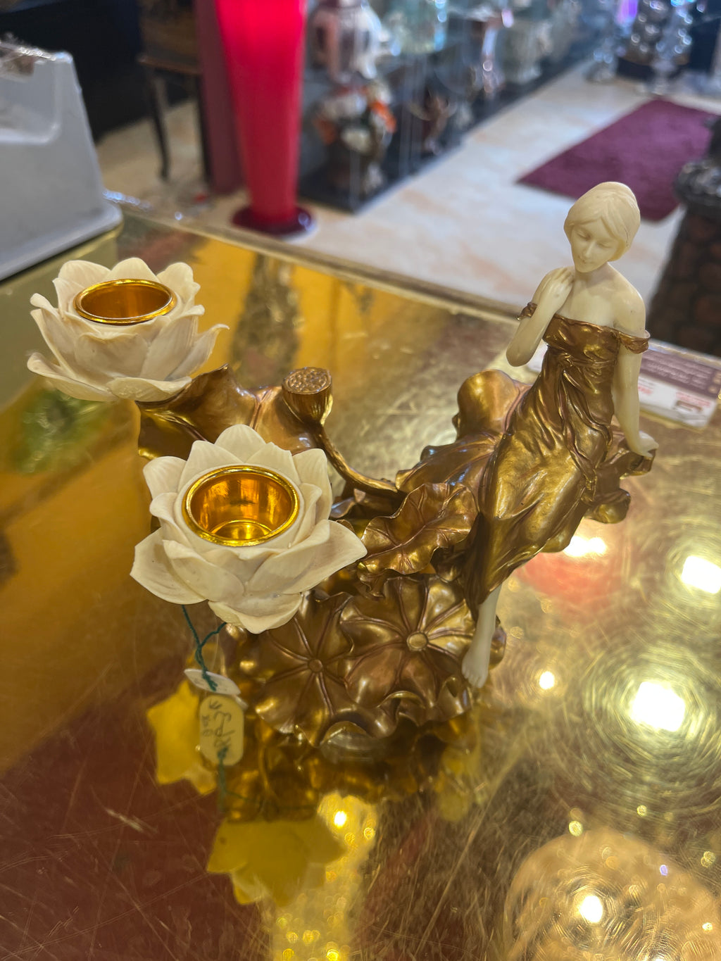 Art nouveau candle holder with wine bottle holder