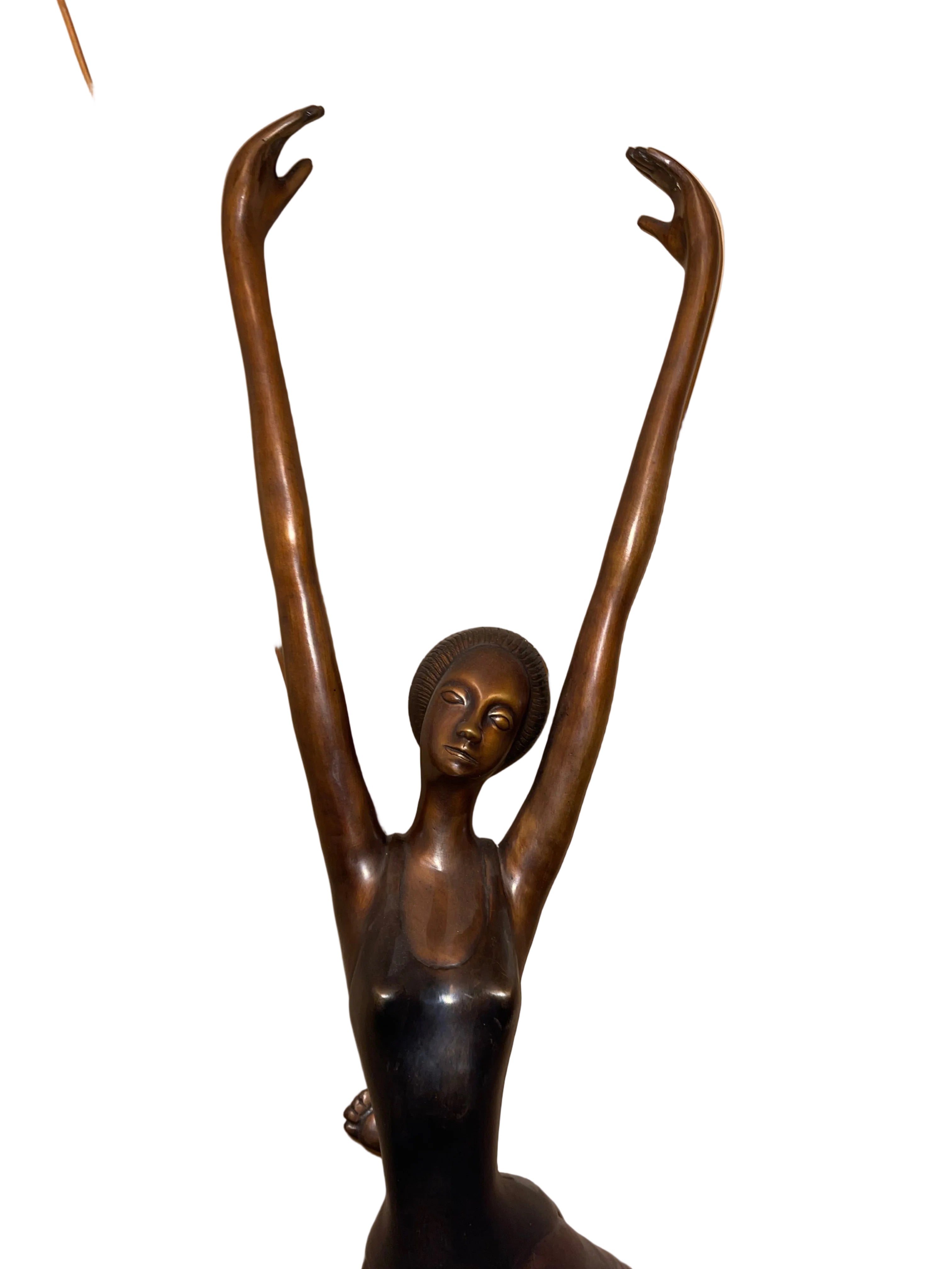 A Large And Beautiful Bronze Sculpture Depicting A Ballet Dancer Captured In A Graceful Pose