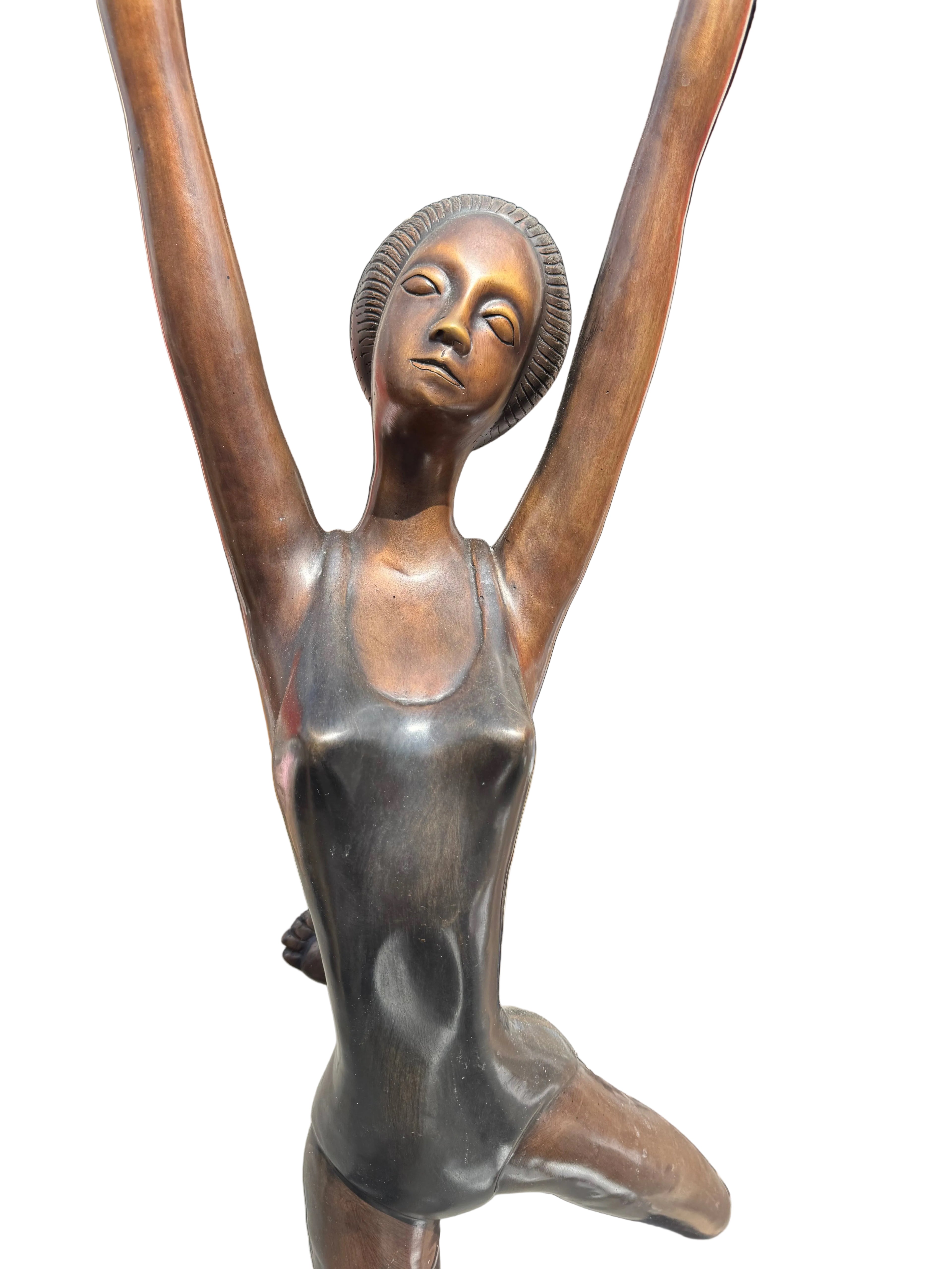 A Large And Beautiful Bronze Sculpture Depicting A Ballet Dancer Captured In A Graceful Pose