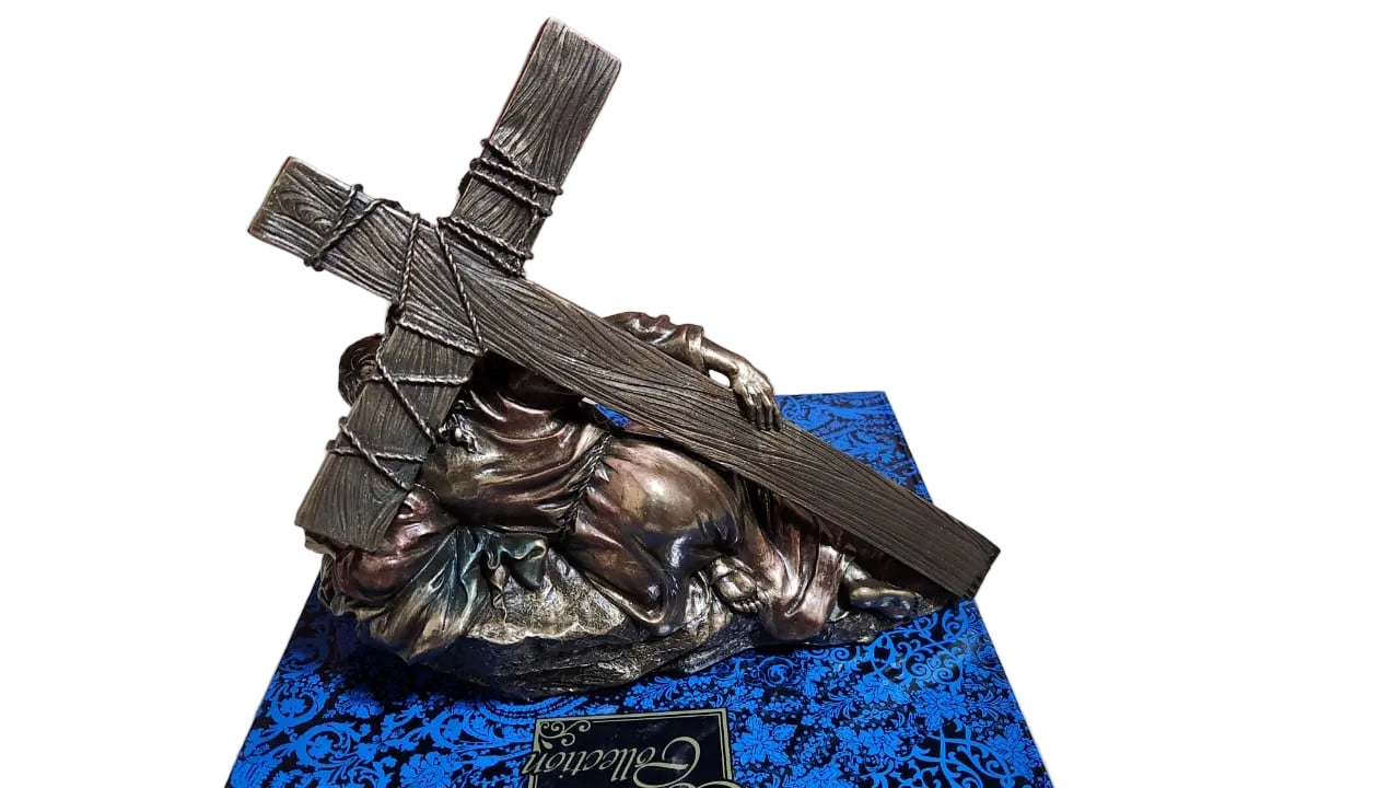 Jesus Christ Caring a cross in bronze color