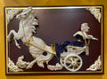 Lady in blue riding horse carriage in ceramic
